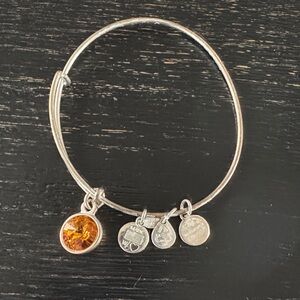 Alex and Ani Silver Bangle with Amber Orange Swarovski Crystal Charm